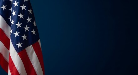 Fototapeta premium Close-up of the united states flag waving against a blue sky