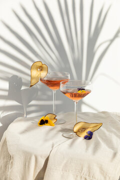 Wine summer cocktails and dried fruit appetizers. Tropical light