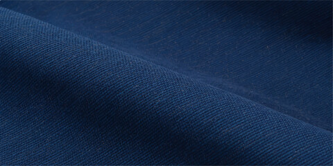 An artistic cloth with a deep blue hue cascades in soft, graceful folds. The luxurious textile presents a visually appealing display of shadows and highlights.  © nur