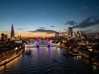 Fototapeta premium London cityscape featuring tower bridge and the shard at sunset