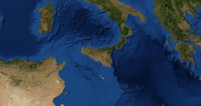 Sicilia on Globe. Zoom into the island with Earth spinning in space. High detail physical world map with Sicilia on it. Elements of this image furnished by NASA.