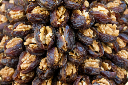 Dates stuffed with walnuts close up