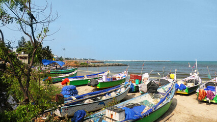 Colorful fishing boats anchored off the coast of Kanyakumari, Tamil Nadu, India © Reji VR