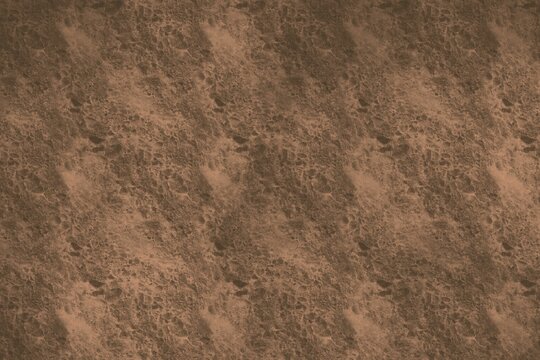 Brown grainy stone texture background, abstract weathered rock surface with speckled pattern