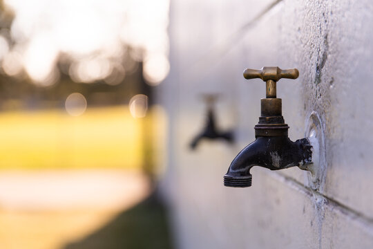 taps on the outside wall of a soccer club building