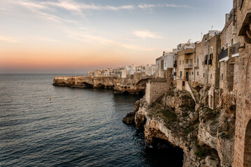 Polignano a Mare town, Houses on the rocks of the coast of Polignano a Mare at the Mediterranean in Italy © Ivan