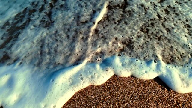 Sea wave washing away year 2029 handwritten on the sandy beach, end of year and new beginning concept.