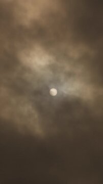 Sun and dust clouds of calima or kalima. 4K Vertical