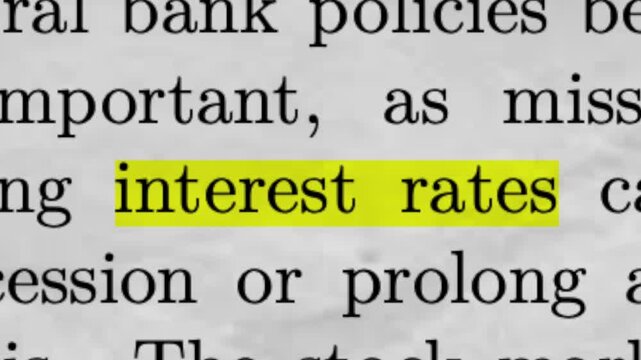 Interest Rates Highlighted in Newspaper Central Bank Economy News Concept Zoom