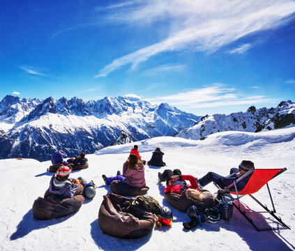 Apr&egrave;s-Ski Vibe of the Chamonix-Mont-Blanc area of the French Alps featuring people relaxing in bean bag chairs and a lounge chair, taking a break from skiing, Chamonix, France, Europe