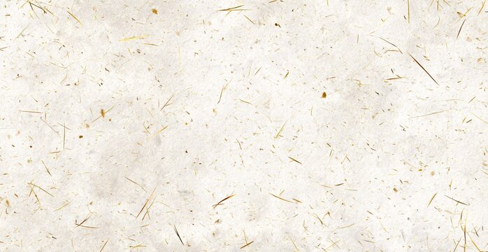 Handmade paper sheet showing grass fiber inclusions and texture