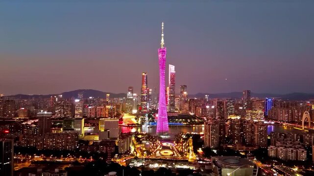 Drone View of Metropolitan Cityscape of Guangzhou City at Night with Futuristic Cyberpunk Light