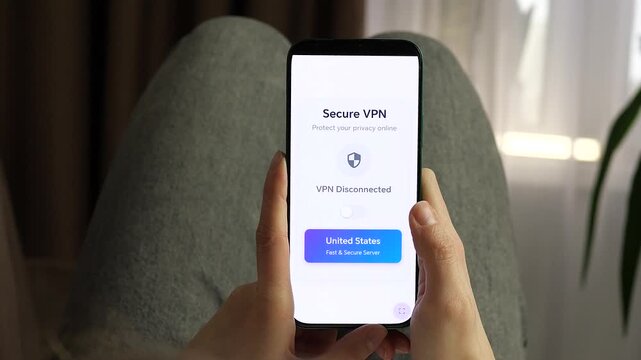 Using a Secure VPN app on a smartphone to protect online privacy. Interface showing a fast United States server connection. Essential footage for cybersecurity, data protection, and internet safety