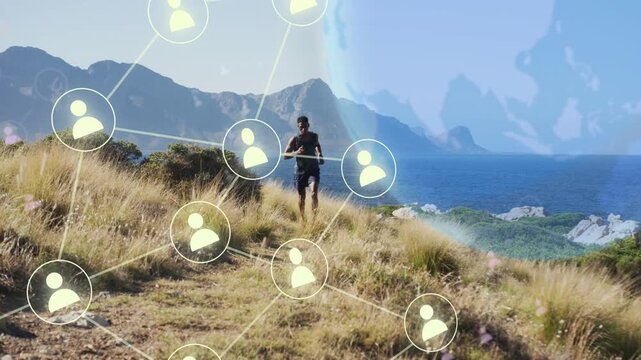 Male runner jogging trail glancing phone causing tech network icons spreading into globe overlay