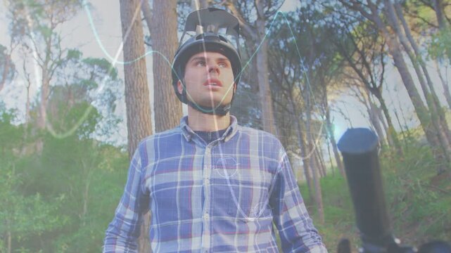 Cyclist scanning woods for hazards while camera lowering, bringing bar closer with squiggle overlay