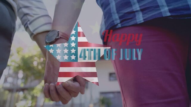 Couple approaching, joining hands in yard, watch visible as July 4 star fading over hands marketing