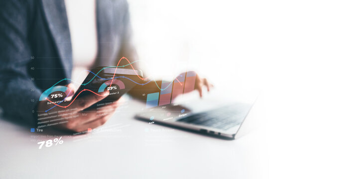 Businessman Use Phone Analyzing Financial Data Analytics and Business Intelligence Strategy on Laptop and Smartphone with Virtual Digital Overlay