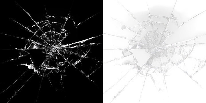 Broken glass fragment on a transparent background showing patterns of cracks and shards in detail