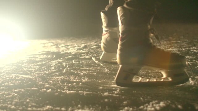 Detailed image emphasizing ice crystal edges and tool marks clearly. Close perspective capturing ice shards along with footwear edges and tool impressions in ice surface