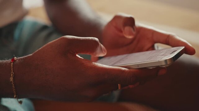 Close Up Of Hands Using A Smartphone