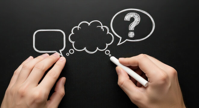 Hands holding white chalk drawing speech and thought bubbles on a black chalkboard background with a question mark symbol