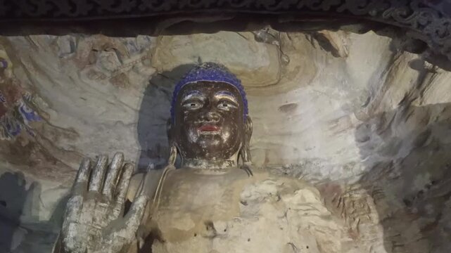 Ancient Buddhist Stone Carvings in Yungang Grottoes, Datong, China.