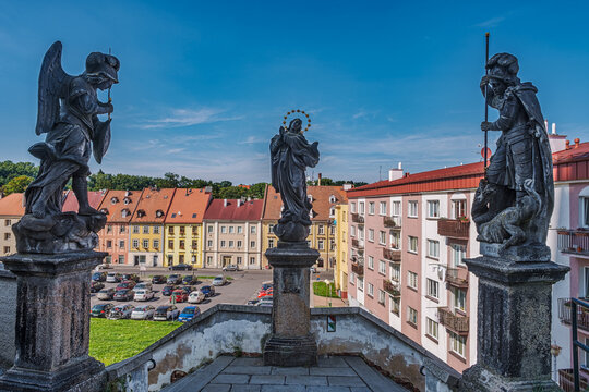 The statue of the Immaculate Virgin Mary and the Holy Archangels Michael and George stands on the steps leading up to the Church of St. Nicholas and St. Elizabeth in the old town of Cheb, Czech Republ