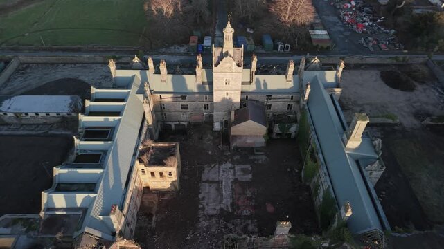 Aerial view of Denbigh Mental Asylum in the UK, conveying isolation
