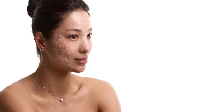 Woman with dark hair poses in profile with dotted facial scan grid across face and neck on white copy space background. Made for skincare diagnostics, beauty tech and cosmetic ads.