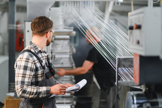 Engineer controlling polypropylene thread production in factory