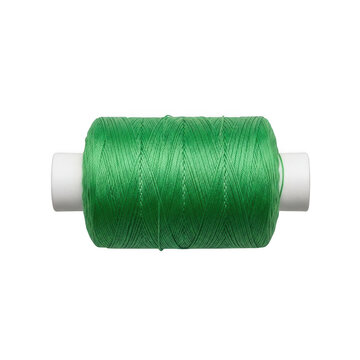 A spool of bright green twine or string on a cardboard tube