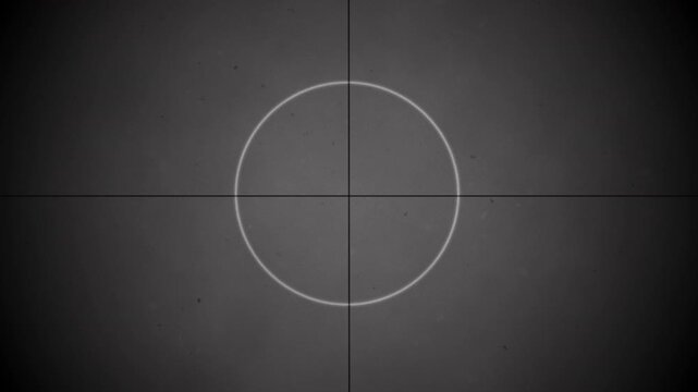 Retro film reel 15 second countdown animation with vintage grainy texture and crosshairs. ProRes High Quality 4k video