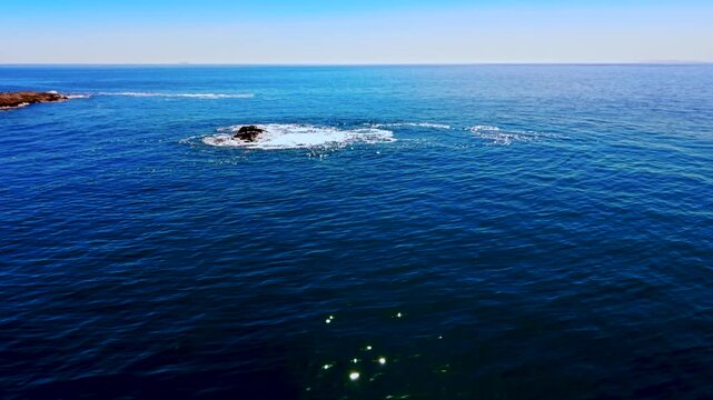 Aerial view of open blue ocean to infinity