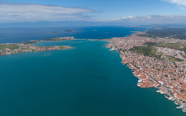 Obraz premium Aerial View of Ayvalik City Center with Coastal Architecture and Blue Aegean Sea Turkey