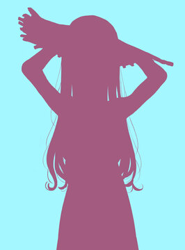 麦わら帽子を被ったロングヘアの女の子　押さえる　シルエット