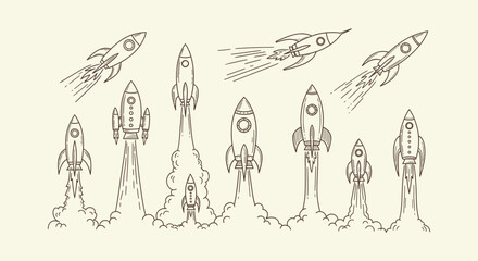 Set of hand drawn space rocket launch illustrations. Vintage style spacecraft and shuttle icons. © RUMA
