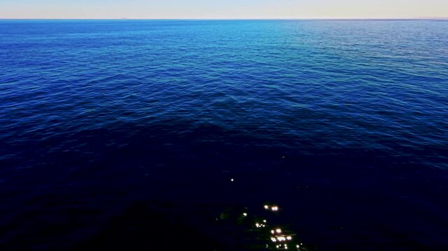 Aerial view of open blue ocean to infinity