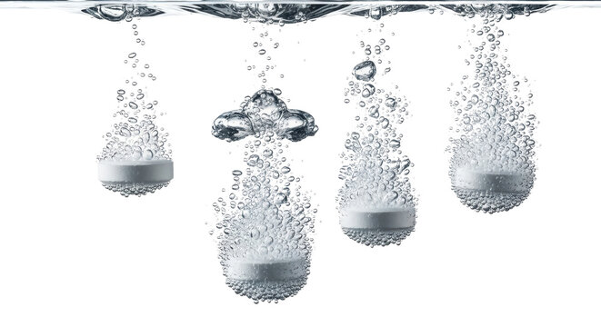 Effervescent white tablets dissolving in water with bubbles, soluble medicine pills in liquid, pharmaceutical supplement concept isolated PNG with Transparent Background