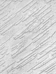 Fototapeta premium White Rough Plaster Wall Texture Vertical Close Up Photo Diagonal Brushstroke Pattern Textured Surface Background Architectural Material Detail