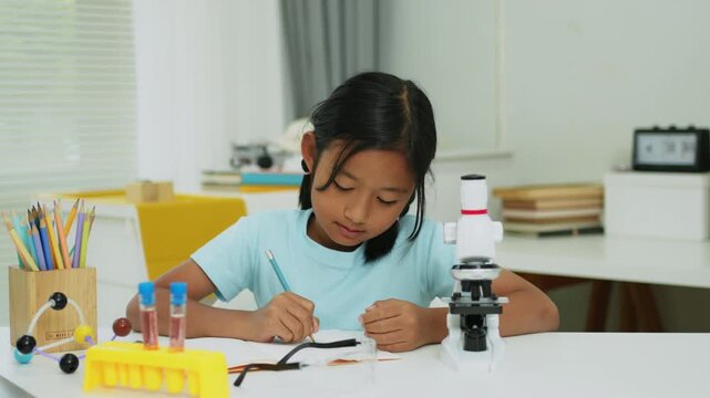 STEM Education Concept with Student Scientist and Laboratory Analysis Equipment
