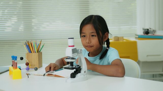 STEM Education Concept with Student Scientist and Laboratory Analysis Equipment