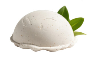 Fototapeta premium Single scoop of speckled vanilla ice cream with fresh green leaves, isolated on white background