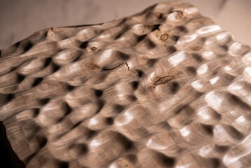 Naklejka premium Abstract organic wooden surface with natural texture, knots, and flowing curves