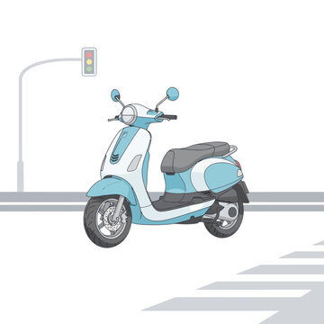A stylish light blue and white scooter parked on a street with a traffic light.