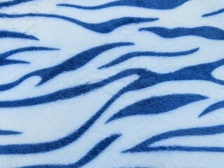 Blue and white tiger stripe pattern fabric texture background. © dedinature 