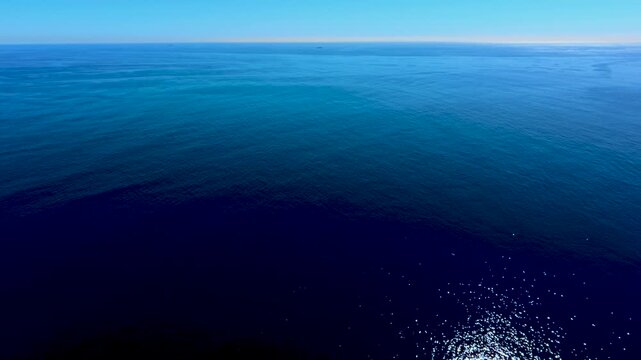 Aerial view of open blue ocean to infinity
