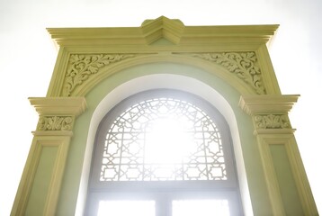 Fototapeta premium Green archway with white window