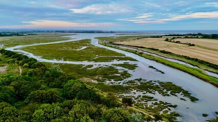 Fototapeta premium Aerial drone view of Pagham Harbour RSPB nature reserve near Sidlesham, West Sussex
