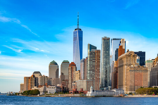 A distant view across the water shows the dense cluster of high rise buildings in the downtown financial district.