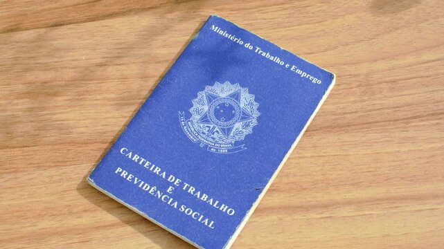 Brazilian work ID on a wooden surface, symbolizing employment and career in the Brazilian context.